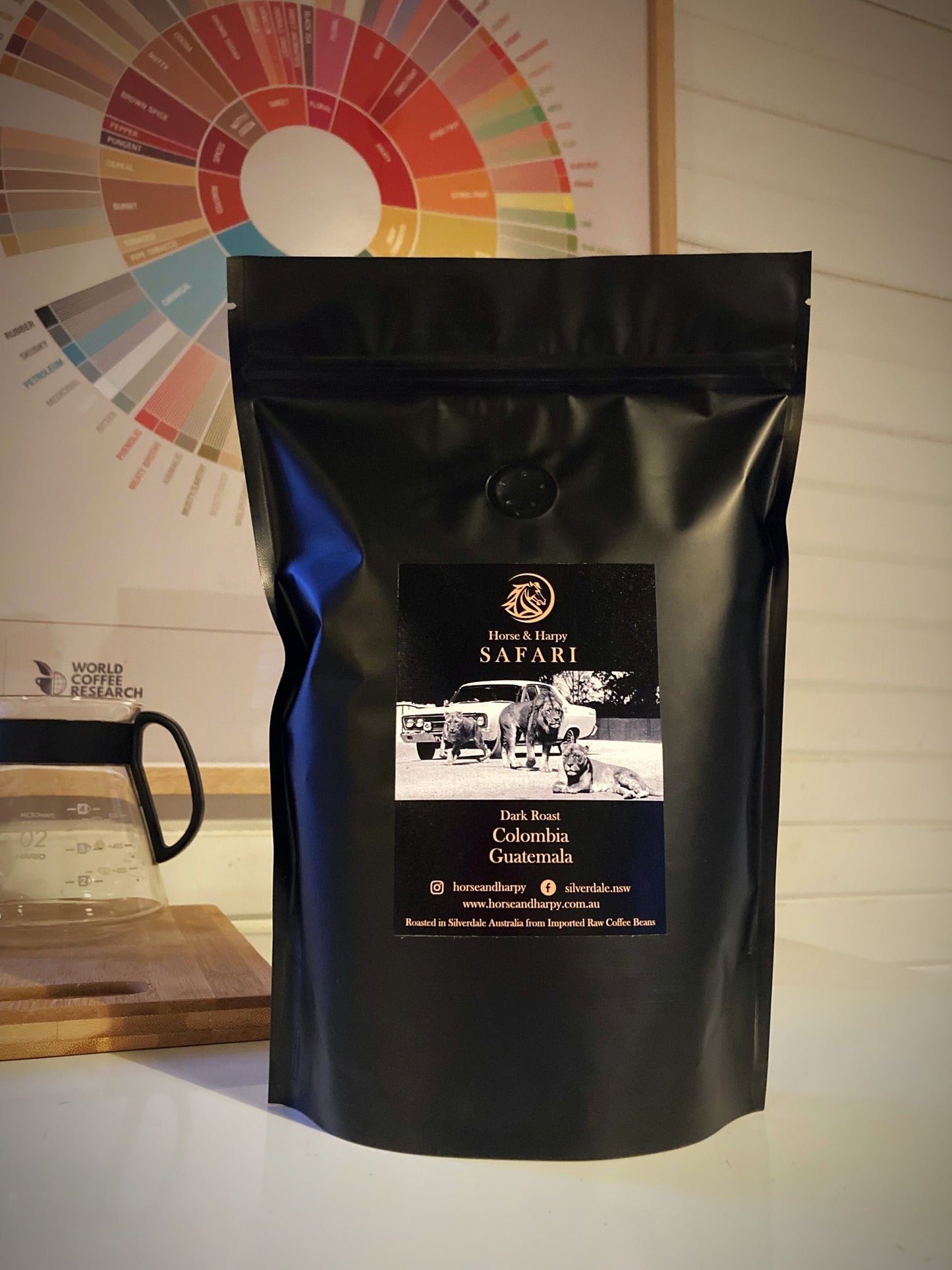 Freshly brewed cup of Horse and Harpy Safari Blend Dark Roast coffee in a mug, showcasing its rich, dark color and aromatic qualities.